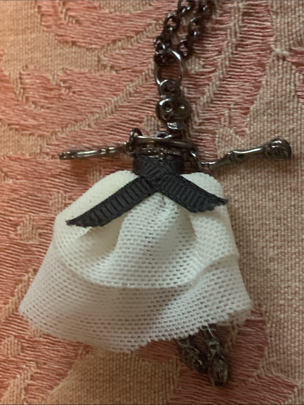 Whimsical Skeleton Doll Pendant Necklace with Cream Fabric Skirt